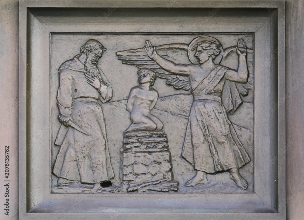 Naklejka premium Sacrifice of Isaac, Close-up of a biblical relief on the Lion Gate of the Cathedral of Saint James in Sibenik, Croatia