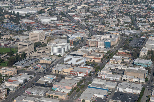 Aerial view of downtown Inglewood with civic buildings, commercial corridors, and mixed-use development near Los Angeles, California, USA.