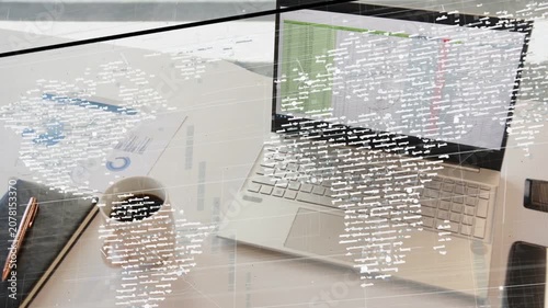 Live feed driving overlay, laptop showing map lines moving right down revealing keys showing trends