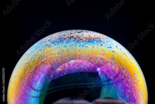 Photos  soap bubbles recreating little planets of colors and unique shapes