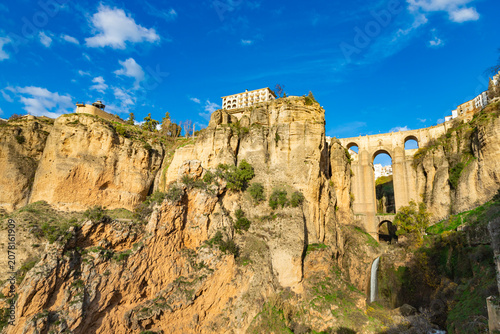 View of the historic Puente Nuevo (New Bridge), stone bridge spanning El Tajo gorge above the Guadalevin River in Ronda, Malaga province, Andalusia, southern Spain
