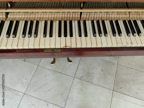 Close-Up of an Old Piano Keyboard with Worn Ivory Keys.