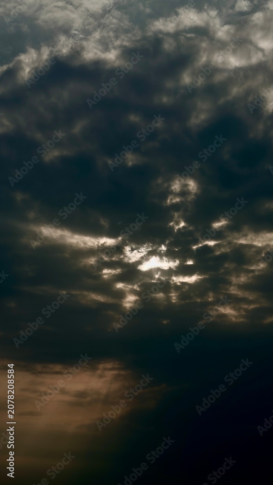 Fototapeta premium Sunlight dark cloudy Sky.