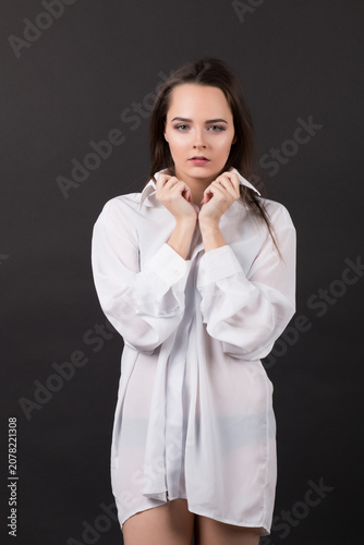 Young Woman Wearing Oversized White Shirt