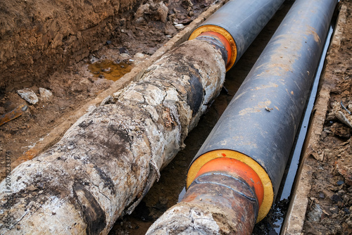 Canvastavla Old district heating pipes with outdated insulation being replaced by new insula