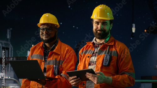 Obraz na płótnie Monitoring ship resources, oil crisis and cheerful offshore rig crew members, managing gas extraction operation, maritime embargo and smiling drilling barge employees, camera A for energy operations