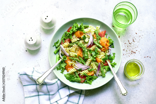 Bild auf Leinwand Pasta salad with vegetables : asparagus, tomatoes, carrot