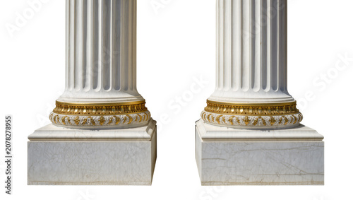 Fotografie Isolated white marble classical architectural columns with gilded bases on plint
