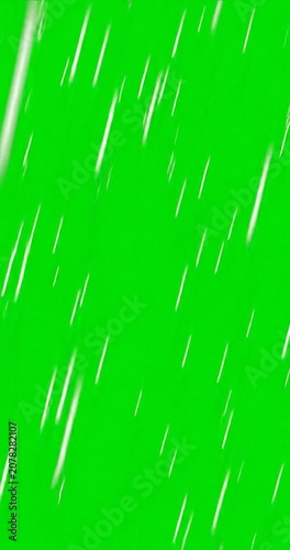 Heavy rain falling diagonally on green screen chroma key background
