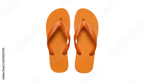 Картината върху платно Isolated pair of vibrant orange summer flip-flops, essential for beach trips and
