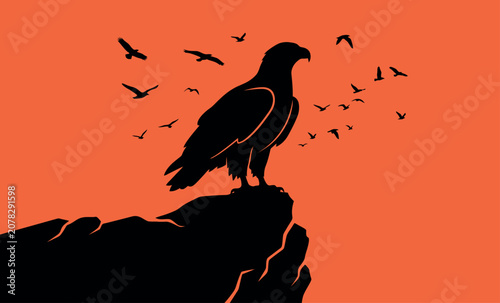 Photography Majestic Eagle Silhouette Perched on a Mountain Cliff Against a Vibrant Orange S
