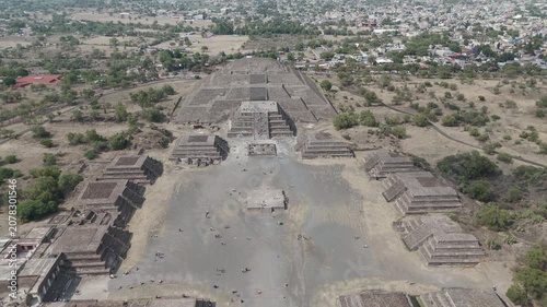 Aerial perspective capturing the vastness of the ancient avenue of the dead, flanked by impressive pre aztec pyramids and temples at the teotihuacan archaeological site near mexico city