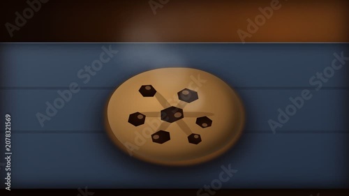 Freshly Baked Chocolate Chip Cookie Cooling on a Blue Surface.
