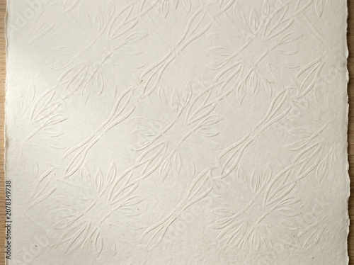 White Embossed Handmade Paper with Floral Pattern and Deckled Edges