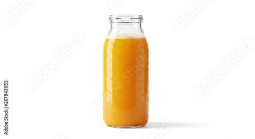 Orange juice in a clear glass bottle isolated on a white background