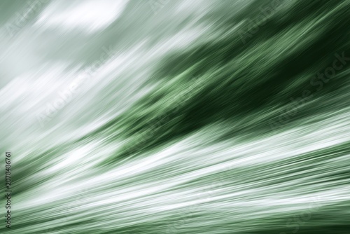 Abstract green motion blur flowing diagonally in a minimalist organic pattern for eco-friendly branding and wellness website backgrounds