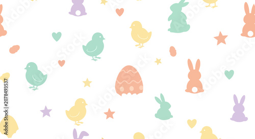 Easter themed pattern with rabbits eggs chicks and stars on white background