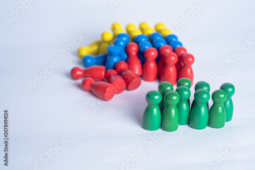 Community affected by earthquake represented with colorful peg figures