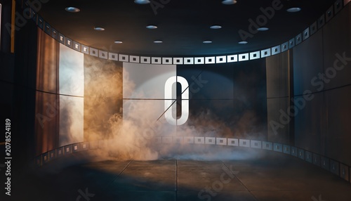 Dark room with curved walls and circular ceiling lights