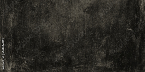 Dark grungy wall black background with scratches and texture for design and layout