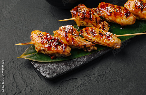 Картината върху платно Grilled chicken wings yakitori with teriyaki glaze