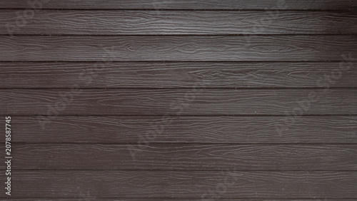 Background texture displaying horizontal dark brown wooden siding panels. The clean timber surface shows uniform planks with subtle natural organic woodgrain fibers shera siding.