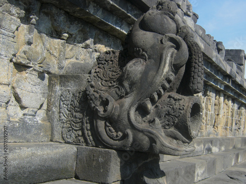 Quadro su tela Close up of traditional Makara stone water drain spout and detailed ancient reli