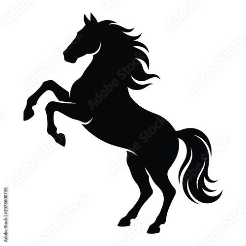 Fotografía Black silhouette of a rearing horse with flowing mane and tail on white backgrou
