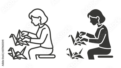 Konstfotografi Origami Art: Two stylized illustrations depict a person engrossed in the art of origami, carefully folding paper into intricate crane shapes, showcasing creativity and patience