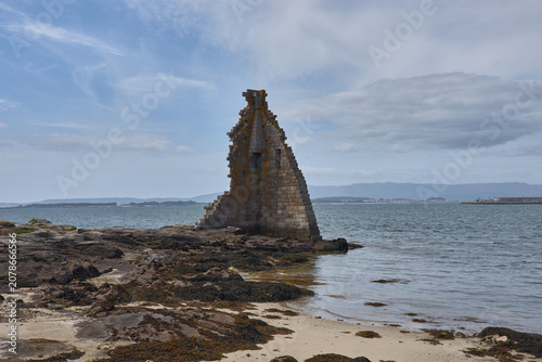 The ruins of the Tower of San Sadurnino rise above the sea on the islet of A Figueira, Cambados, Galicia