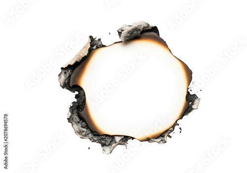Circular burnt paper hole with scorched edges isolated on transparent background for creative design projects