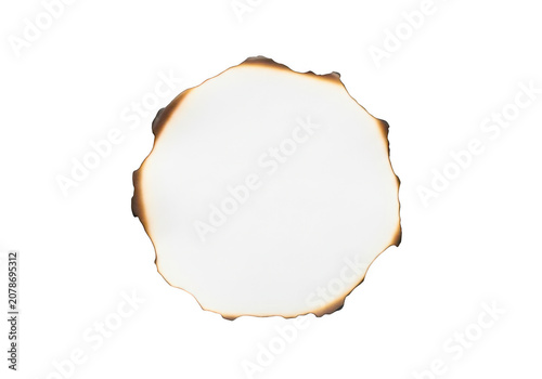Circular piece of paper with burnt edges isolated on transparent background for creative frames