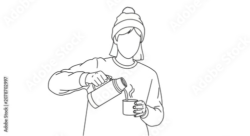 Person pouring hot drink from thermos into cup.