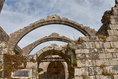 Fotografie The carved stone arches of Santa Marina Dozo preside over the historic cemetery