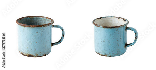 Two matching rustic blue enamel metal mugs isolated on transparent background