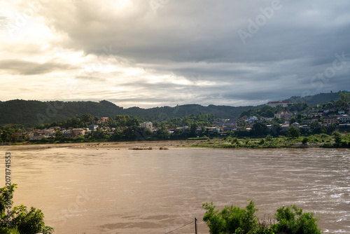 Scenic Mekong River landscape with Huay Xai Laos viewed from Thailand