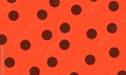 Foto Bold polka dot pattern with dark brown circles scattered on vibrant orange backg