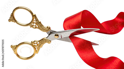 Golden scissors cutting red ribbon isolated on transparent background