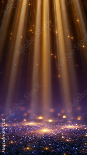 Gold particles falling in light beams over glitter surface