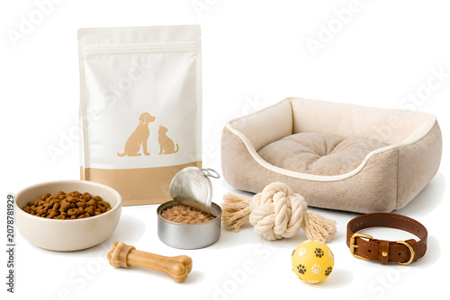 Pet supplies collection with dog food bowl bed toys and collar
