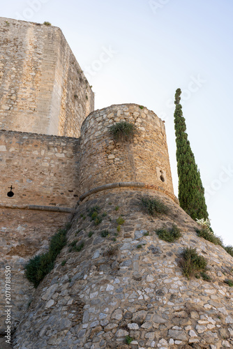 Santiago Castle in Sanlúcar de Barrameda, Andalusia, offering a view of its historic stone wall