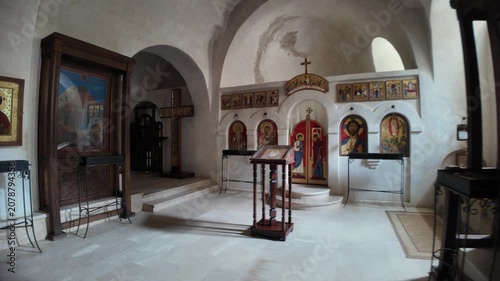 Vardzia, Georgia, May 1, 2025: David Gareji monastery interior featuring ancient orthodox icons, an altar, and a lectern, highlighting spiritual history in Georgia