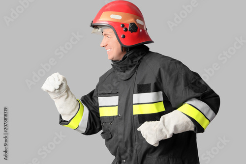 Happy mature male firefight...