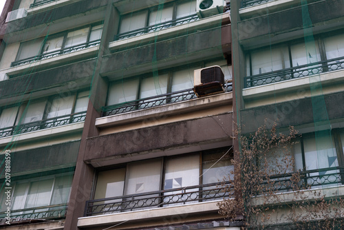 Abandoned Hot Spring Hotel Covered with Green Safety Netting in Ikaho, Japan