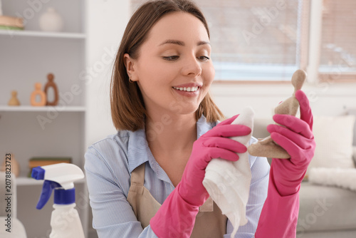 Female janitor cleaning sta...