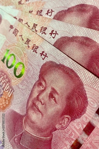 Obraz na plátne Vertical close-up of 100 yuan rmb banknotes with portrait and denomination marki