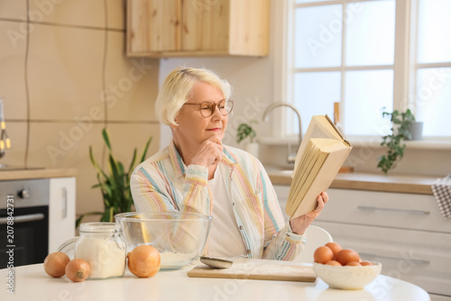 Thoughtful senior woman wit...