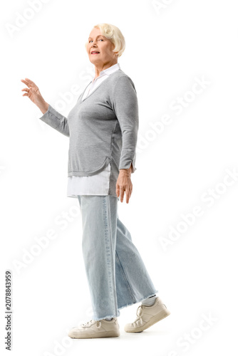 Senior woman on white backg...