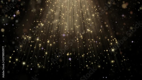 Golden light rays descend through the darkness while shimmering dust particles float in the air.