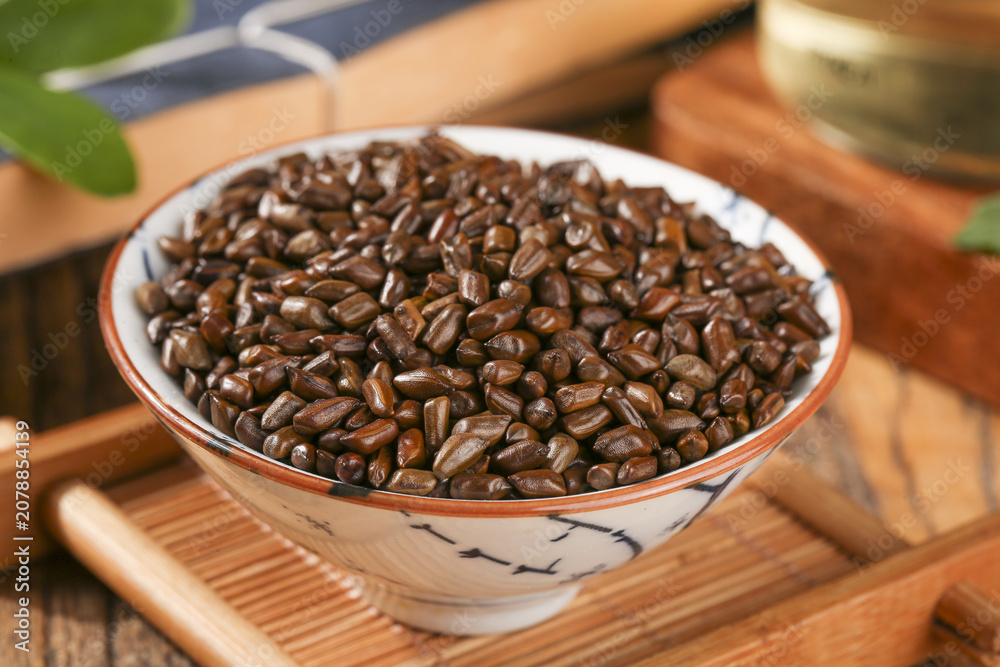 Fototapeta premium Traditional Chinese Bowl of Roasted Coffee Beans on Bamboo Tray - Healthy Hot Beverage Culture